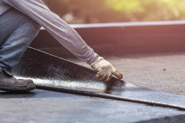 Professional Emergency Waterproofing technician working in Augusta, KY